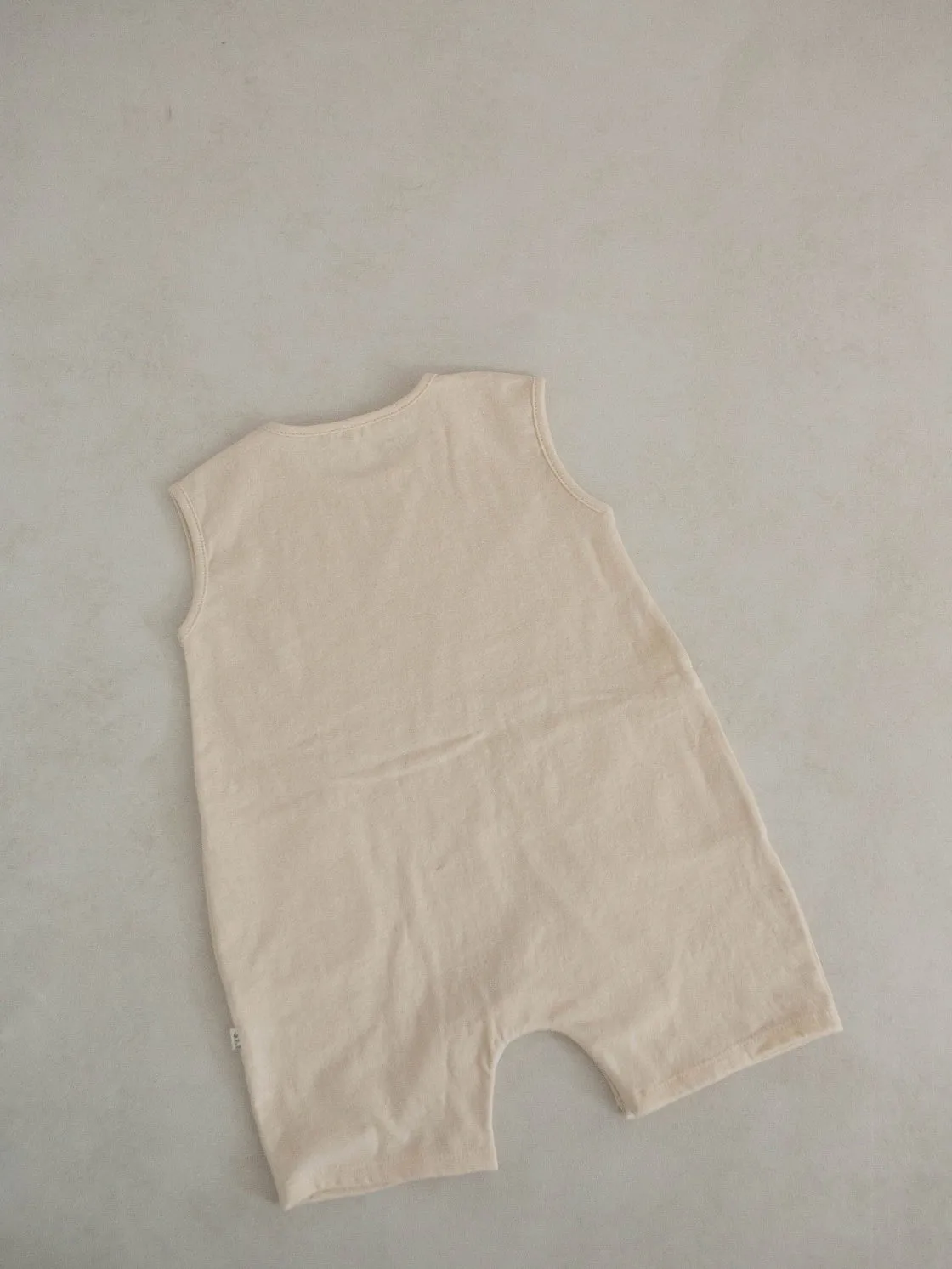 Baby Cotton Sleeveless Pocket Jumpsuit (3-18m)- Ivory