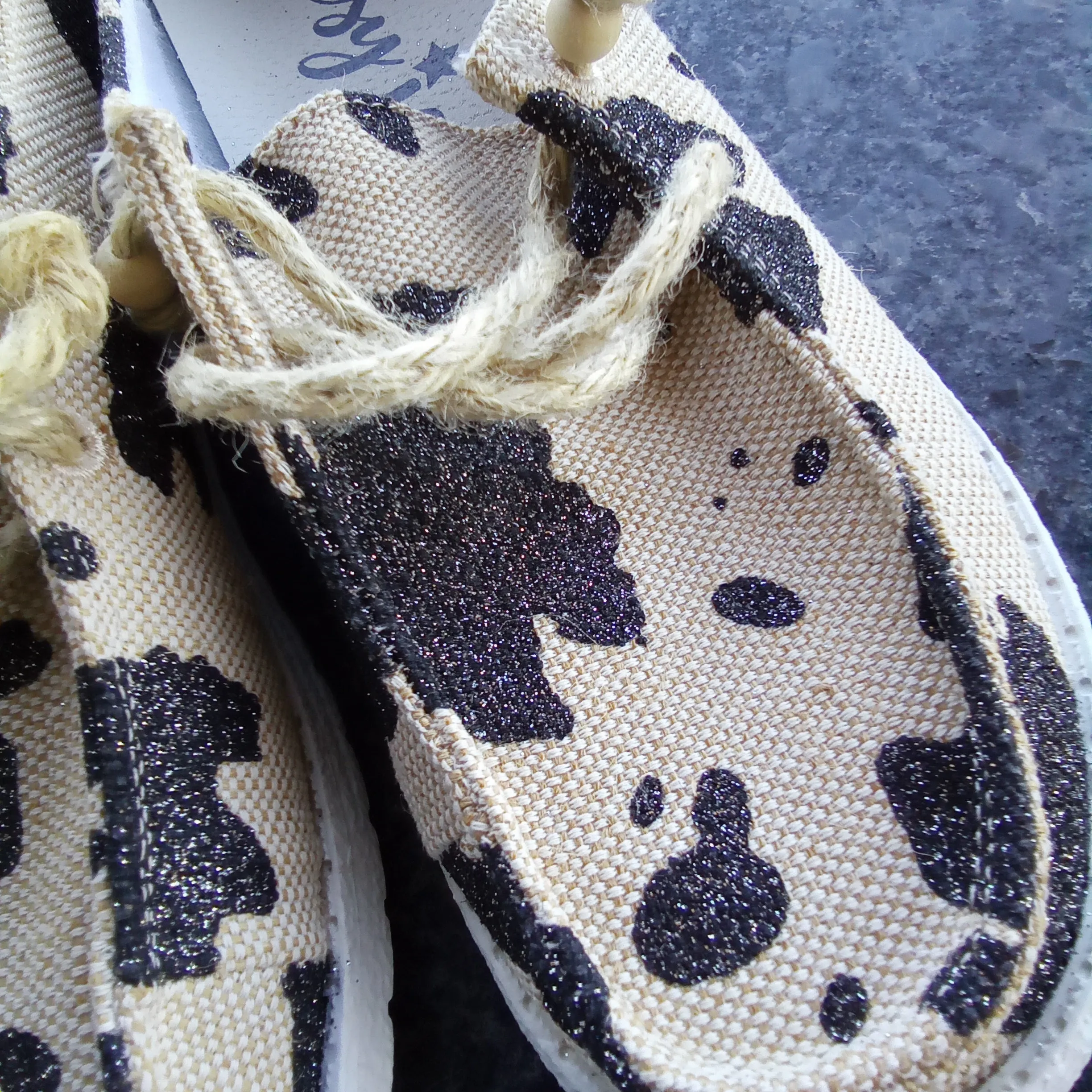 Cream & Black Cow Print Slip Ons | Gypsy Jazz Sparkly Cow