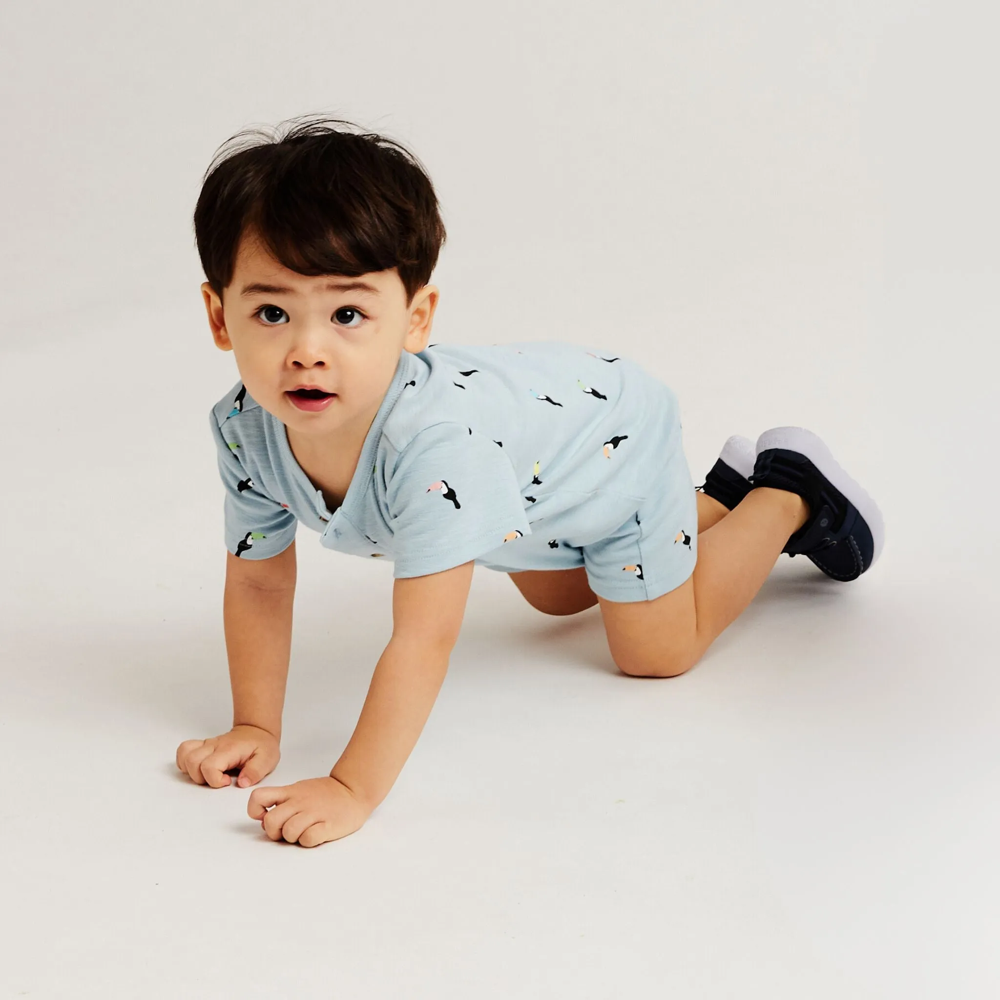 Infant Knit Short Sleeve Romper with Bib | Blue Toucan Print