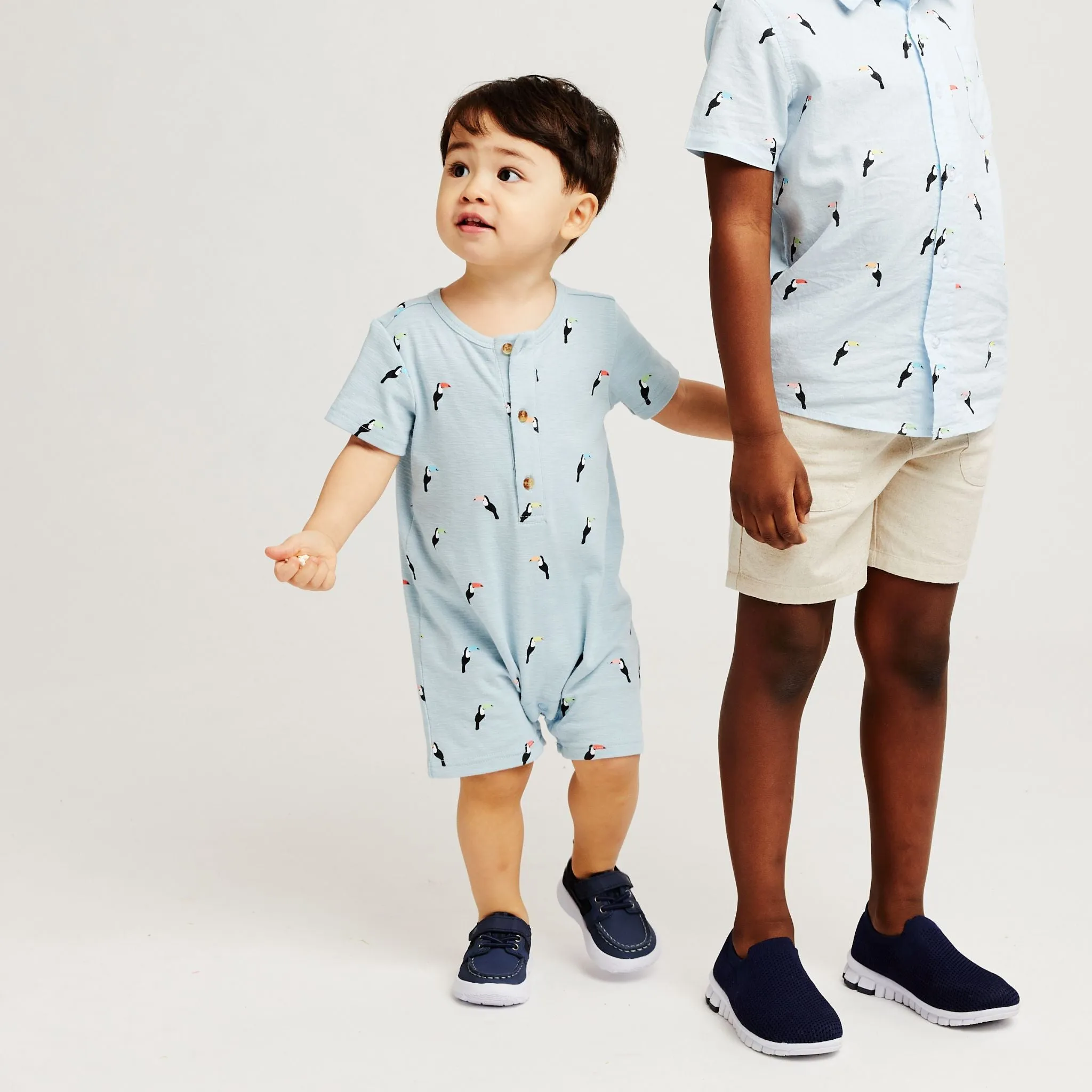 Infant Knit Short Sleeve Romper with Bib | Blue Toucan Print